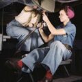 Women working on a plane, lookimg capable and stylish