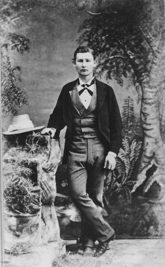 Five classic vintage workwear styles - Studio portrait of a young man 1870-1880