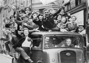 Seamstress, Tailor, Soldier, Spy. A truck full of people parading through the Strand, London, Ve Day Celebrations , 8 May 1945