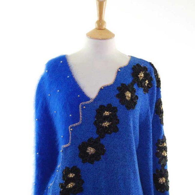 Close up front Blue Angora And Cotton 80s Sweater With Black Appliqued Flowers