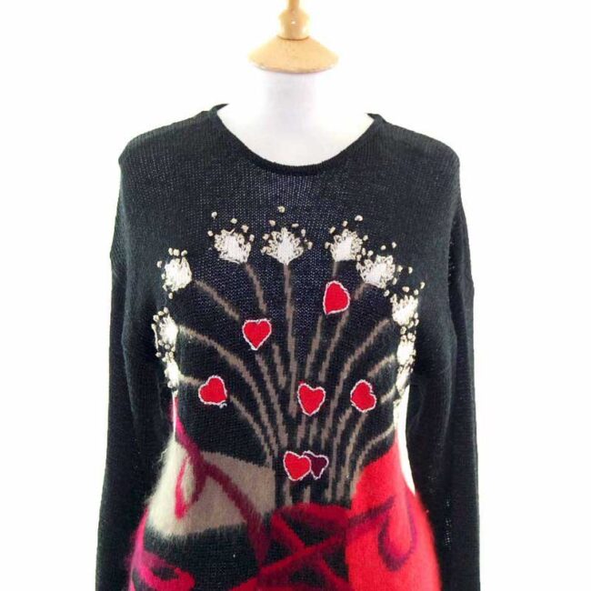 Close up of Multicoloured Hearts And Flowers Motif 80s Jumper