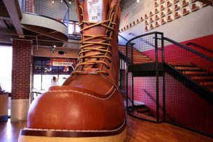 What are the best vintage workwear brands. Red Wing factory outlet with the Largest Boot in the world on display, Minnesota, USA