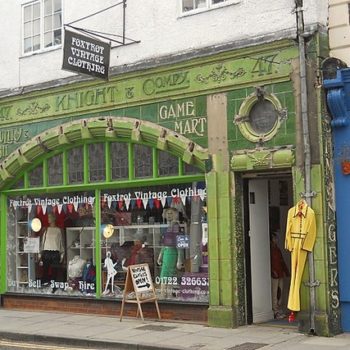 cheap retro clothing shop front with signage, original tiling & windows
