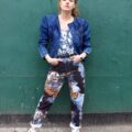 Ali models 1980’s jean jacket, with a multi-colored patterned pair of vintage mom jeans