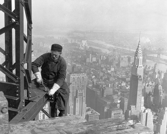 Workman helping construction of the Empire State Building. ny, ny,1930 Workman helping construction of the Empire State Building. ny, ny,1930