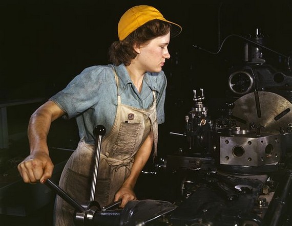 Female Turret lathe operator wearing coveralls, 1942 Female Turret lathe operator wearing coveralls, 1942