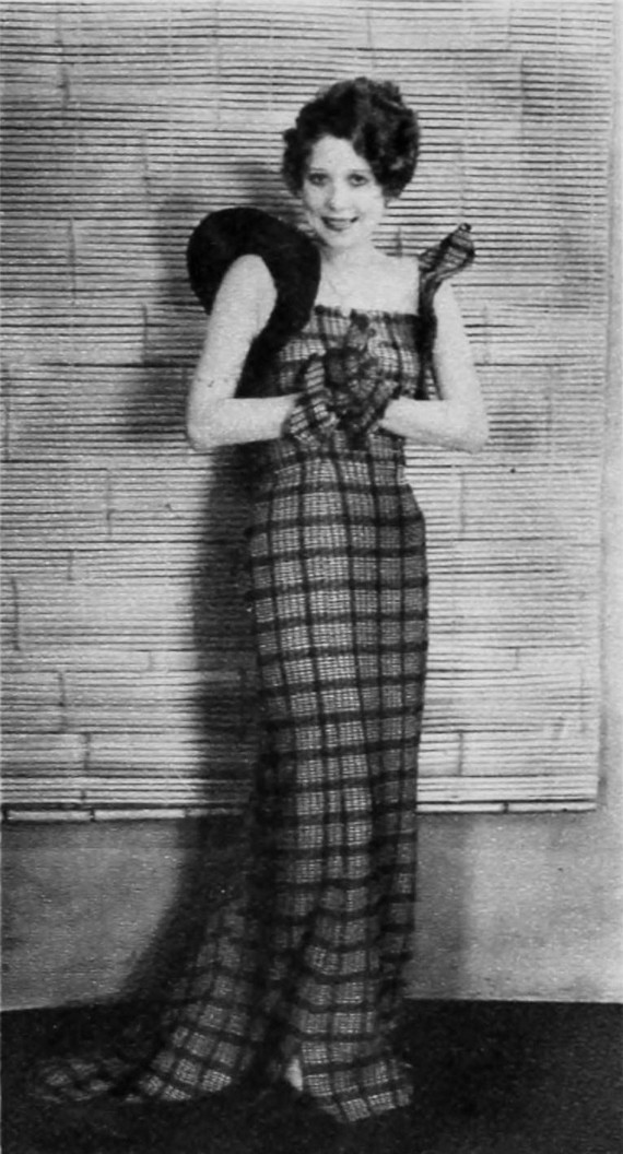 Annette Hanshaw modelling Dress designed by Gladys Parker, Oct. 1934. Annette Hanshaw modelling Dress designed by Gladys Parker, Oct. 1934.