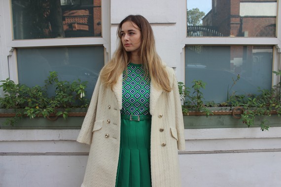 Green knife pleated skirt along with a top in diamonds of green, blue and white Green knife pleated skirt along with a top in diamonds of green, blue and white