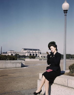 Fashion in the 40s - Woman applying lipstick near Union Station , Washington, D.C. 1943.