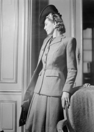 40s 50s Fashion - model wears a wool checked suit by fashion designer Hardy Amies, 1945