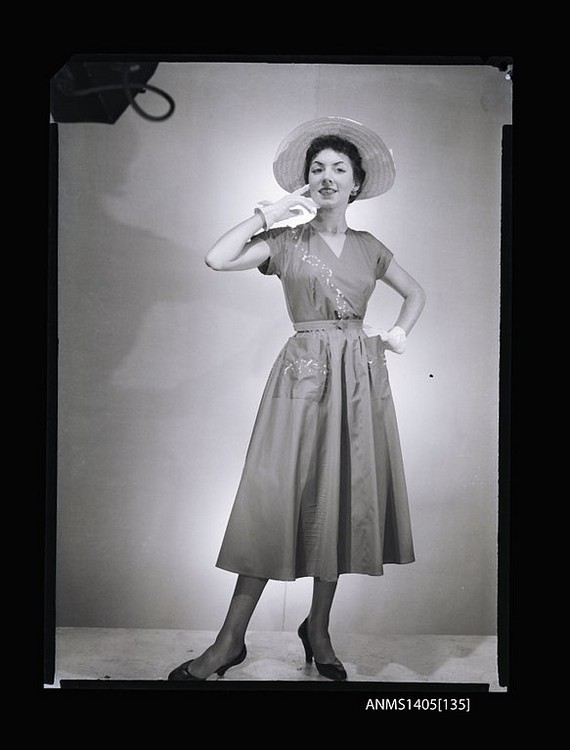 Woman modelling a summer dress, 1954 Woman modelling a summer dress, 1954