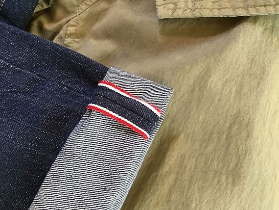 Indigo denim jeans with red selvedge seams Indigo denim jeans with red selvedge seams