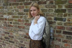 Alex models Leopard print trousers and white long sleeved blouse