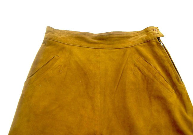 Font close up of 90s Mustard Yellow Suede Shorts