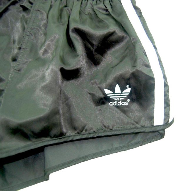 front of 90s Adidas Black Satin Shorts