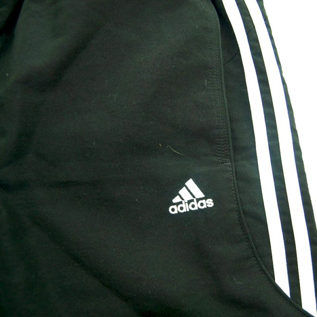 front of 90s Adidas Black Shorts
