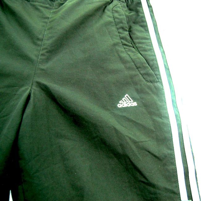 front of 90s Adidas Sport Shorts