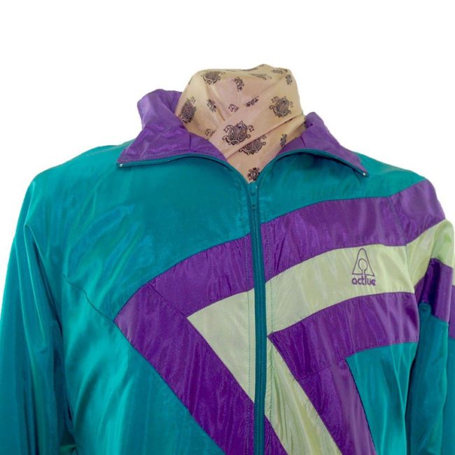 front of 90s Teal Shell Suit Jacket