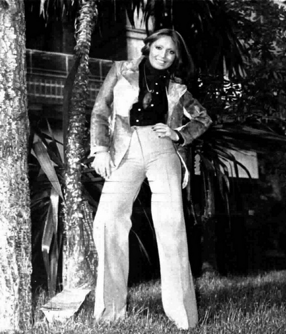 Lara Saint Paul in bell botton jeans, 1973 Lara Saint Paul in bell botton jeans, 1973