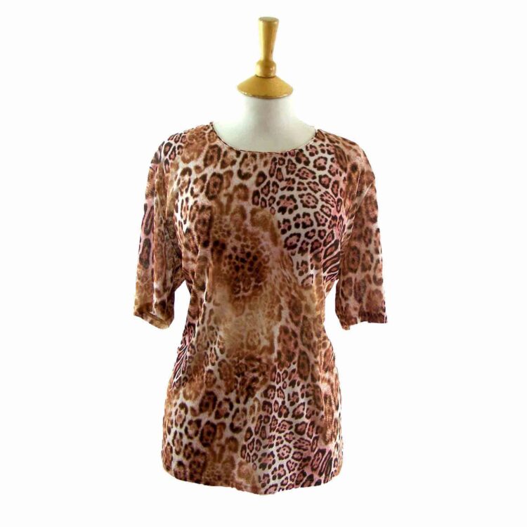 90s_animal_print_top@price18product_catwomentops1970s-topsshop-vintage-by-decade1970spa_colormulticolouratt_size10att_era90stimestamp1443960352.jpg