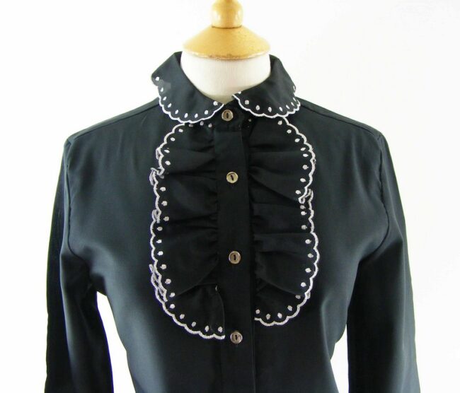 Close-up-of-60s-Ruffled-Black-Blouse