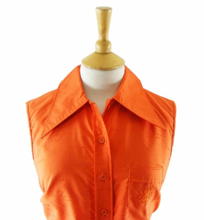 Close-up-of-70s-Orange-Sleeveless-Blouse