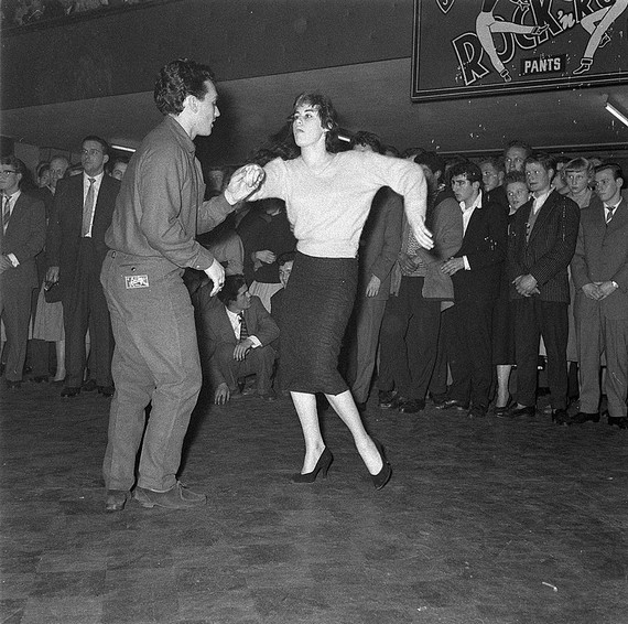 Rockabilly couple jiveing at Rock and Roll dance in 1957