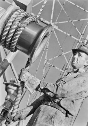 Work jacket - Worker on oil derrick, 1938