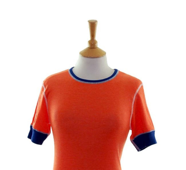 Close up of 70s Tangerine Orange Tee Shirt