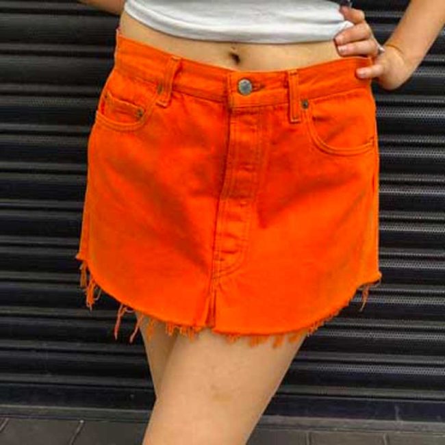 close up of side of 90s Orange Levis Mini Skirt