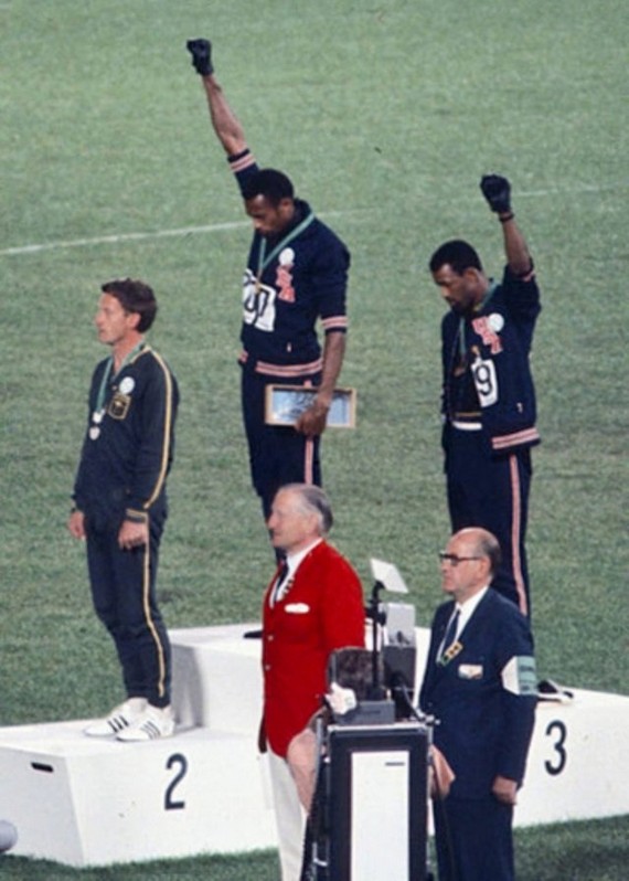 John Carlos,Tommie Smith, Peter Norman at the Mexican olympics receiving awards for 200 metres race in 1968 John Carlos,Tommie Smith, Peter Norman at the Mexican olympics receiving awards for 200 metres race in 1968