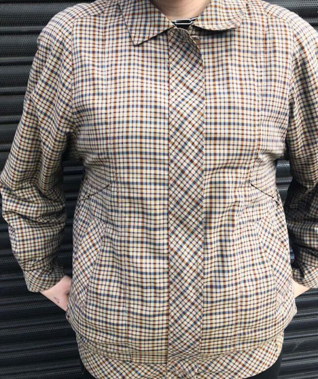 close up of 80s Small Brown Check Bomber Jacket