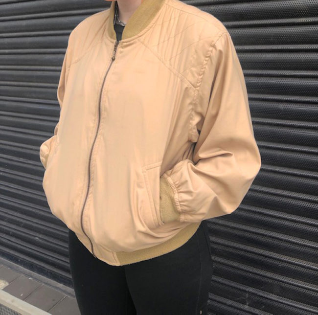 side of 80s Light Beige Retro Bomber Jacket