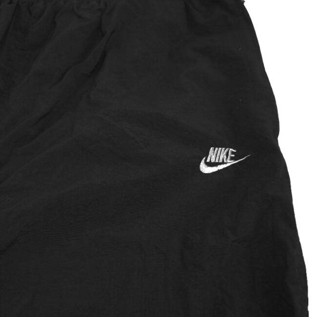 logo of 90s Nike Thick Black Joggers