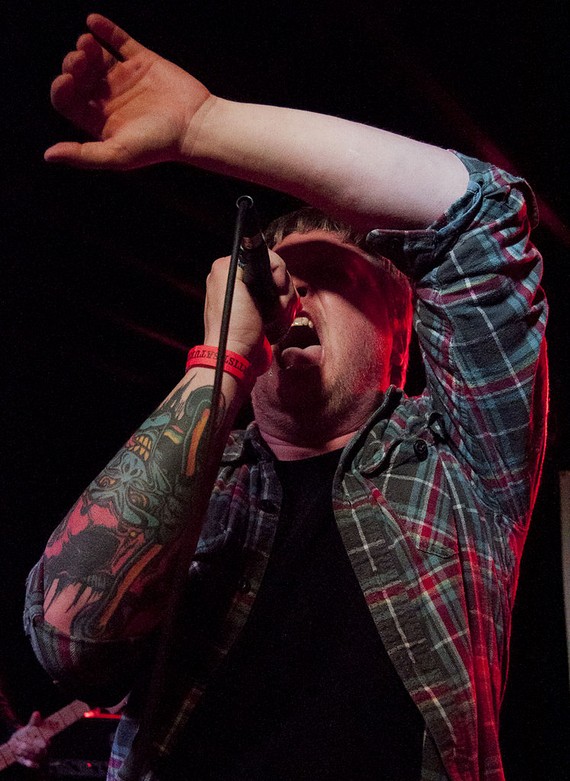 Rocking his flannel shirt Rocking his flannel shirt