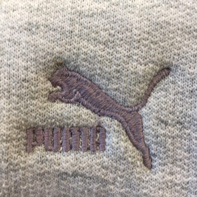 label of Puma Grey Tracksuit