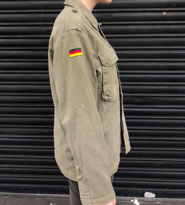 side of Plain Green German Camouflage Jacket