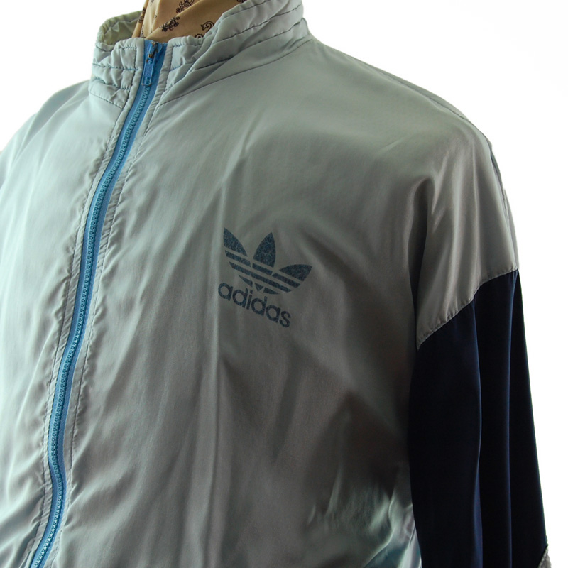 close side of Adidas Grey And Blue Windbreaker