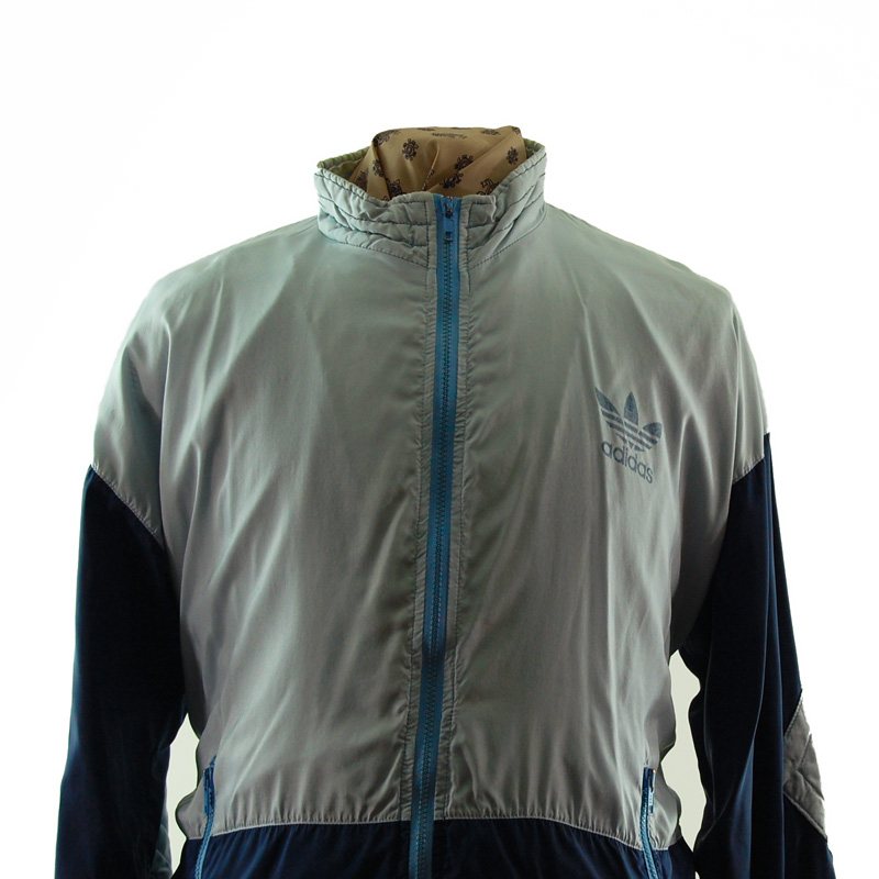 close up of Adidas Grey And Blue Windbreaker