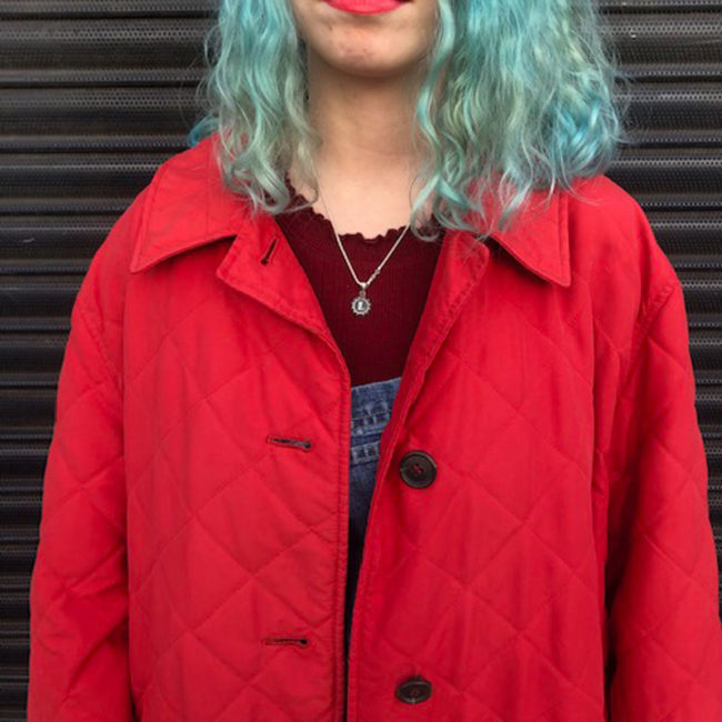 close up of Red Burberry London Coat