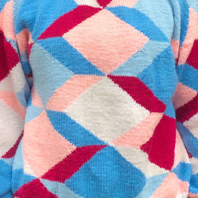 close up of 80s Multicolored Geometric Shapes Sweater
