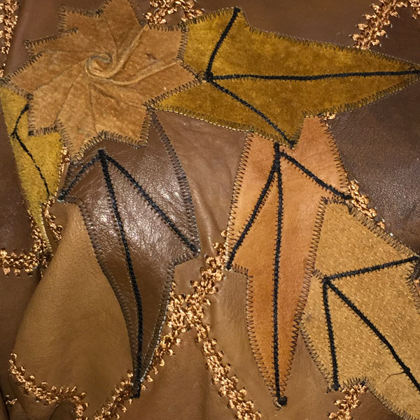 close up of Vintage Brown Diamond Patchwork Jumper