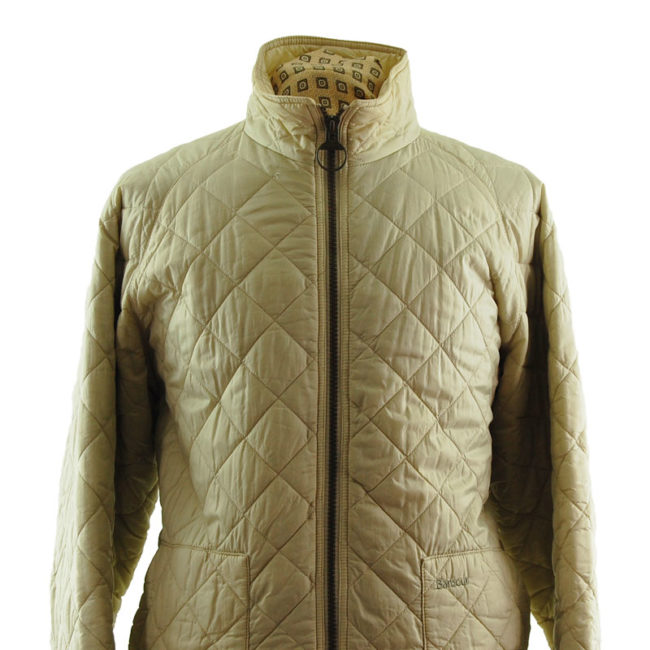 close up of Barbour Cream Quilted Coat