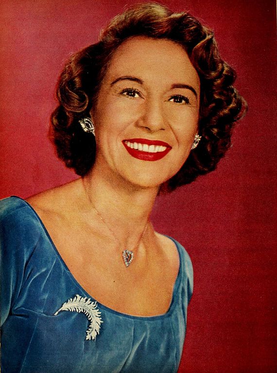 Arlene Francis wears blue velvet dress, silver leaf brooch and heart shaped pendant necklace, - TV Radio Mirror, February 1957 Arlene Francis wears blue velvet dress, silver leaf brooch and heart shaped pendant necklace, - TV Radio Mirror, February 1957