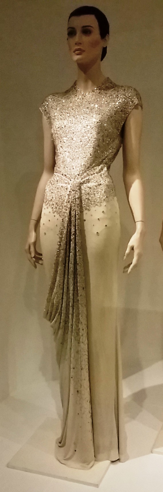 1960s Fashion - Cream silk jersey evening gown with silver beading and sequin embroidery by Norman Hartnell, 1960 1960s Fashion - Cream silk jersey evening gown with silver beading and sequin embroidery by Norman Hartnell, 1960