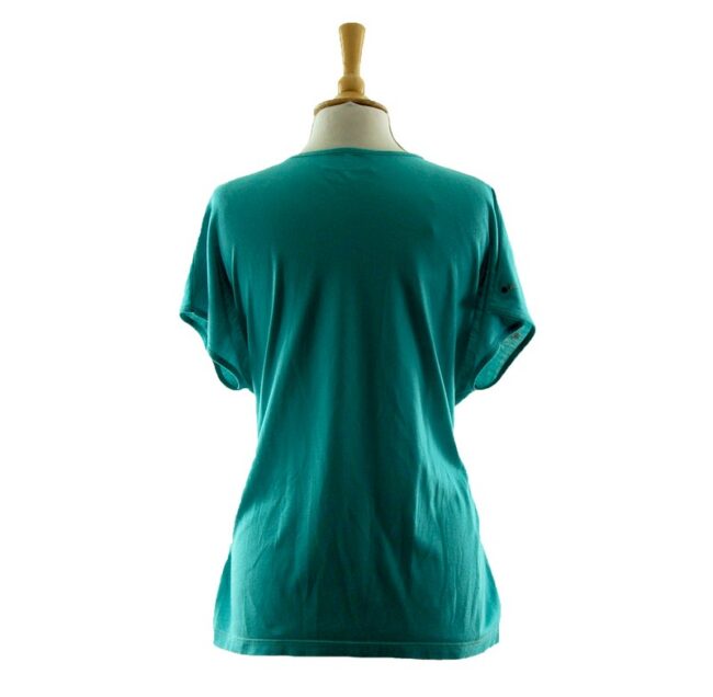 Back of Womans Turquoise Floral 80s Print T Shirt