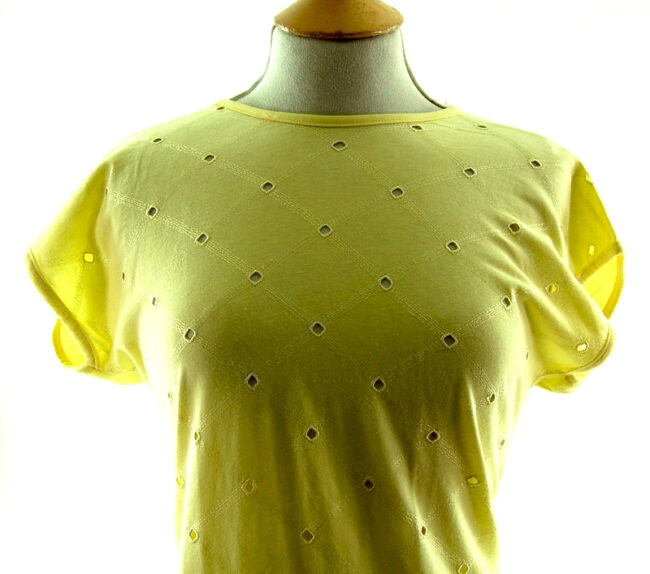 Close up front of Womans Pale Yellow 80s t shirt