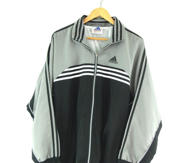 Adidas Track jacket with front stripes close up