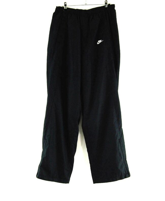 BLACK NIKE SHELL SUIT TROUSERS