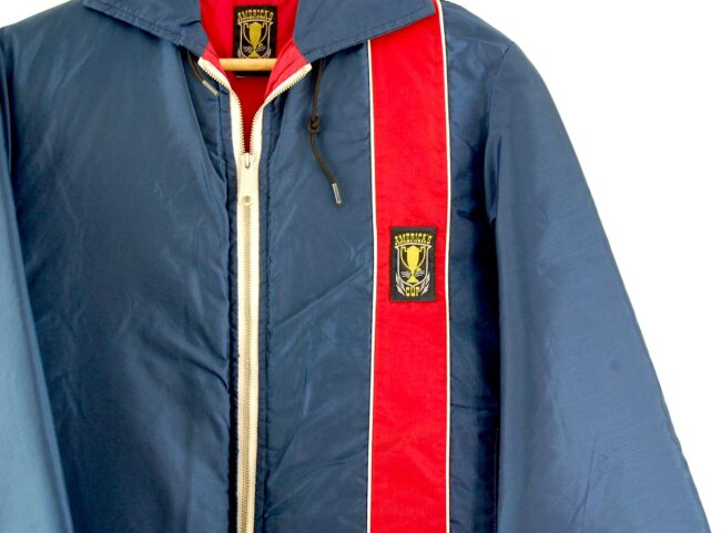 Close up of of Red And Blue Americas Cup Jacket